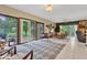 Bright living area with large windows, wood framed windows, and comfortable seating at 10444 N State Road 9, Fountaintown, IN 46130