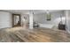 Spacious finished basement with a recreation area and wood-look vinyl plank flooring at 10510 Inverness Ct, Fishers, IN 46037