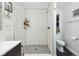Updated bathroom features a walk-in shower with white subway tile and mosaic floor at 117 N Market St, Thorntown, IN 46071