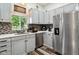 Functional kitchen with stainless steel appliances, ample counter space, and modern fixtures for easy meal preparation at 117 N Market St, Thorntown, IN 46071