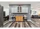 Open-concept kitchen area with built-in cabinets and easy access to the living room, ideal for Gathering interaction and entertaining at 117 N Market St, Thorntown, IN 46071
