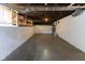 Unfinished basement with concrete floor, painted walls, and exposed utilities at 1311 N Oakland Ave, Indianapolis, IN 46201