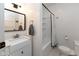 Stylish bathroom featuring a vanity with a vessel sink, and a shower with a shower curtain at 1311 N Oakland Ave, Indianapolis, IN 46201