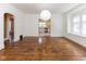 Open dining area with natural light and view of kitchen at 1311 N Oakland Ave, Indianapolis, IN 46201