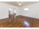 Spacious living room with polished hardwood floors and lots of natural light at 1311 N Oakland Ave, Indianapolis, IN 46201