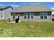 Spacious backyard with a patio and outdoor seating for enjoying the outdoors at 1349 Sunset Blvd, Avon, IN 46123