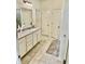 Bathroom featuring a granite countertop vanity with a large mirror and tile floor at 1349 Sunset Blvd, Avon, IN 46123