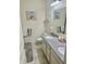 Bathroom with a double sink vanity, granite countertop, and neutral tile flooring, creating a clean, modern space at 1349 Sunset Blvd, Avon, IN 46123