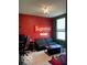The unique bedroom features a fun decor with gaming-themed elements and comfortable seating at 1349 Sunset Blvd, Avon, IN 46123