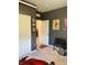 Comfortable bedroom with soft carpet, neutral gray walls, art decor, and a glimpse of an open doorway at 1349 Sunset Blvd, Avon, IN 46123