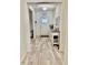 Inviting entryway featuring neutral walls, light floors, and a decorative front door with transom window detail at 1349 Sunset Blvd, Avon, IN 46123