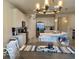 Bright eat-in kitchen with a breakfast bar island, stainless steel appliances, and modern lighting at 1349 Sunset Blvd, Avon, IN 46123