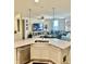 This kitchen features a sink looking into a living room with recessed lights at 1349 Sunset Blvd, Avon, IN 46123