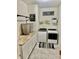Functional laundry room with modern machines, ample counter space, and stylish organizational elements, perfect for chores at 1349 Sunset Blvd, Avon, IN 46123