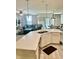 Open-concept space with a modern kitchen island overlooking the living room, perfect for entertaining and Gathering time at 1349 Sunset Blvd, Avon, IN 46123