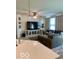 Inviting living room with an open layout, seamlessly connecting to the dining area and kitchen at 1349 Sunset Blvd, Avon, IN 46123