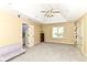 Bedroom with carpet, a ceiling fan, one window with blinds, and a double door to another room at 13909 Waterway Blvd, Fishers, IN 46040