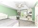The bedroom includes a vaulted ceiling, a ceiling fan, neutral carpet, and a built-in window seat at 13909 Waterway Blvd, Fishers, IN 46040