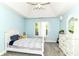 The bedroom features carpet, a ceiling fan, one window with curtains, and matching furniture at 13909 Waterway Blvd, Fishers, IN 46040