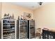 Climate controlled wine room offering ample storage with a counter for serving and enjoying your wine collection at 13909 Waterway Blvd, Fishers, IN 46040