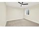 Bedroom with plush carpet, a window, and a modern ceiling fan at 16598 Dominion Dr, Fortville, IN 46040