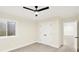 Bedroom with carpet, closet, and window with a safety grate at 16598 Dominion Dr, Fortville, IN 46040