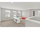 Large bonus room featuring recessed lights, and multiple windows at 16598 Dominion Dr, Fortville, IN 46040