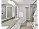 The main bathroom has a double sink vanity, and a glass enclosed shower at 16598 Dominion Dr, Fortville, IN 46040
