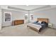 Bright main bedroom featuring recessed lighting, neutral walls, carpet and three windows at 16598 Dominion Dr, Fortville, IN 46040