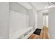 Mud room with coat hooks, bench, storage shelves, and durable flooring at 16598 Dominion Dr, Fortville, IN 46040