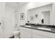 Bright bathroom with double vanity, modern fixtures, and a shower-tub combo at 1725 Hemlock Cir, Greenfield, IN 46140