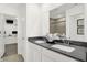 This bathroom features dual sinks and a gray countertop at 1725 Hemlock Cir, Greenfield, IN 46140