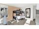A bedroom features a bunk bed and peach colored walls at 1725 Hemlock Cir, Greenfield, IN 46140