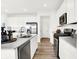 Modern kitchen featuring stainless steel appliances, white cabinetry, and a center island perfect for food preparation at 1725 Hemlock Cir, Greenfield, IN 46140
