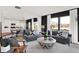 Bright and spacious living room featuring stylish sofas and seamless flow into the dining area at 1725 Hemlock Cir, Greenfield, IN 46140