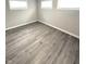 Bright bedroom with multiple windows and neutral walls at 1801 Bauer Rd, Indianapolis, IN 46218