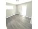 Bright and airy bedroom featuring a door to outside at 1801 Bauer Rd, Indianapolis, IN 46218