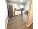 Kitchen boasts wood countertops and stainless steel appliances at 1801 Bauer Rd, Indianapolis, IN 46218