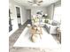 Bright living room featuring a large sectional sofa, stylish decor, and plenty of natural light at 1801 Bauer Rd, Indianapolis, IN 46218
