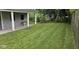 A spacious and well-maintained backyard with lush green grass at 1844 N Riley Ave, Indianapolis, IN 46218