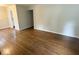 Spacious living room featuring wood floors at 1844 N Riley Ave, Indianapolis, IN 46218