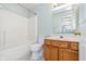 Clean bathroom with a tub/shower combo and a wood vanity at 19061 Fairfield Blvd, Noblesville, IN 46060