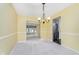 Spacious dining room with modern chandelier at 19061 Fairfield Blvd, Noblesville, IN 46060