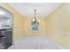 Light and bright dining room with modern chandelier at 19061 Fairfield Blvd, Noblesville, IN 46060