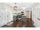 Contemporary kitchen features stainless appliances, island, hardwood floors, and ample natural light at 19061 Fairfield Blvd, Noblesville, IN 46060