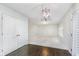Spacious living room with wood floors and a decorative light fixture at 19061 Fairfield Blvd, Noblesville, IN 46060
