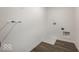 Clean laundry room featuring tile floors and hookups for a washer and dryer at 1961 Black Oak Dr, Shelbyville, IN 46176