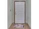 Stylish front door with decorative trim, welcome mat, and neutral color scheme at 2025 Flamingo Way, Franklin, IN 46131