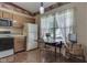 Charming kitchen with a cozy dining nook and vintage decor, perfect for casual meals at 2025 Flamingo Way, Franklin, IN 46131