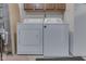 Laundry area with a standard washing machine and dryer set with cabinetry above at 2025 Flamingo Way, Franklin, IN 46131